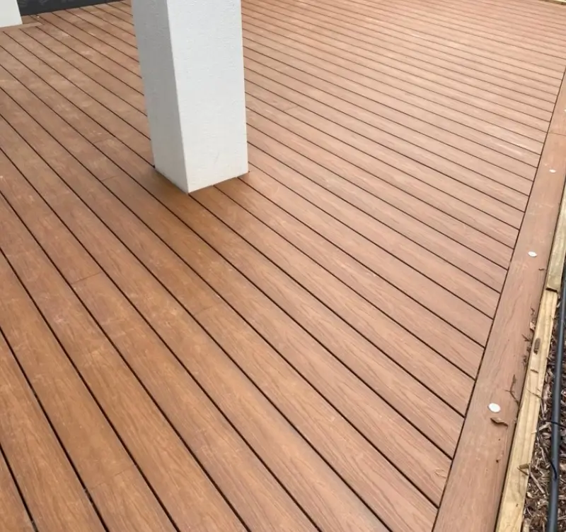 Low-maintenance composite timber decking walkway built alongside a home in Kambah, ACT.