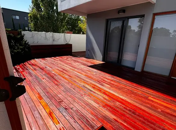 Freshly stained timber deck and outdoor entertainment patio built by EF Building.